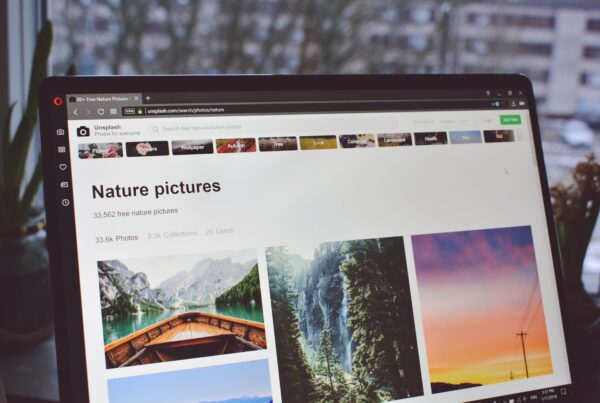 black flat screen monitor on table