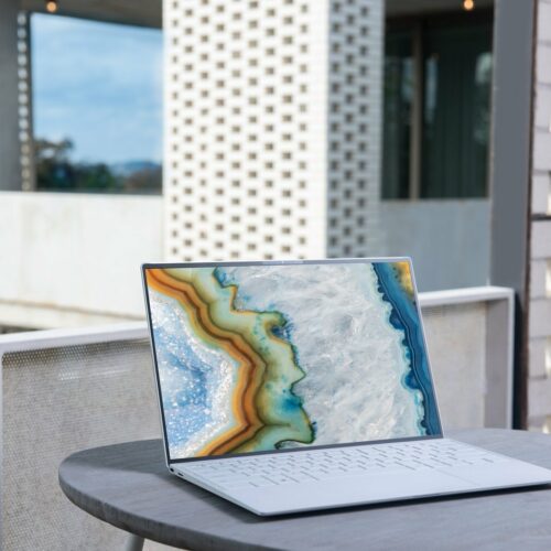 laptop on gray table