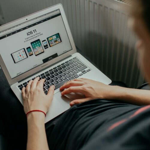 man using MacBook White